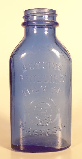 EMBOSSED VINTAGE BLUE MILK OF MAGNESIA BOTTLE