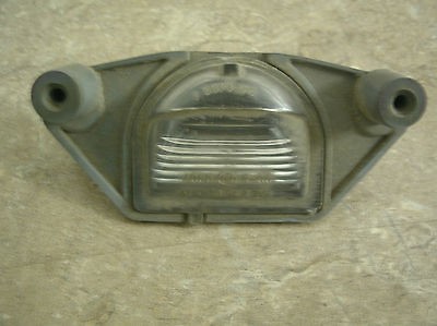 97 03 Grand Prix REAR LICENSE PLATE LIGHT