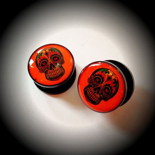 ACRYLIC ORANGE RASTA SKULL EAR GAUGE PLUG sugar bob marley wiz 