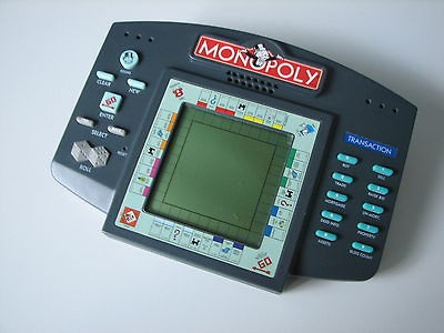 Electronic Handheld Hand held game Monopoly Hasbro 1997 hand held