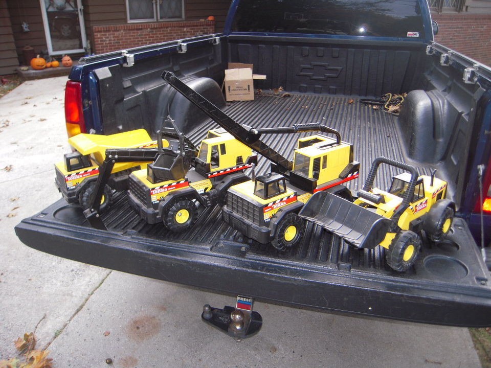   COLLECTION OF 4 DUMP TRUCK, LOADER, CRANE AND DIGGER NEAR MINT