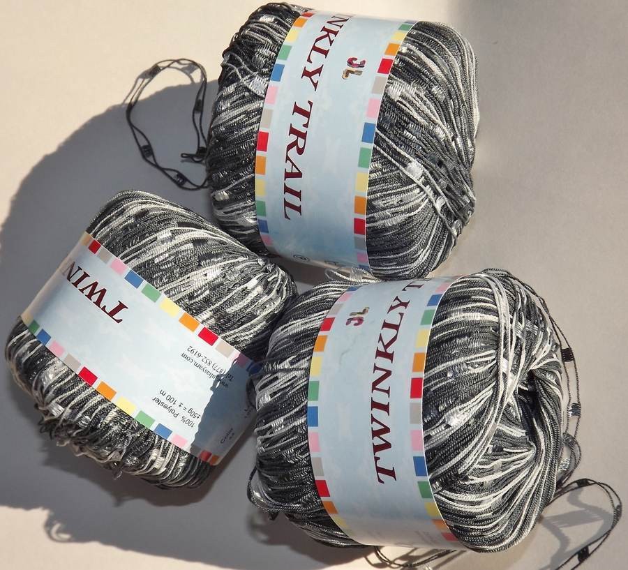 balls of TWINKLY TRAIL ladder trellis yarn #44 Grey multi