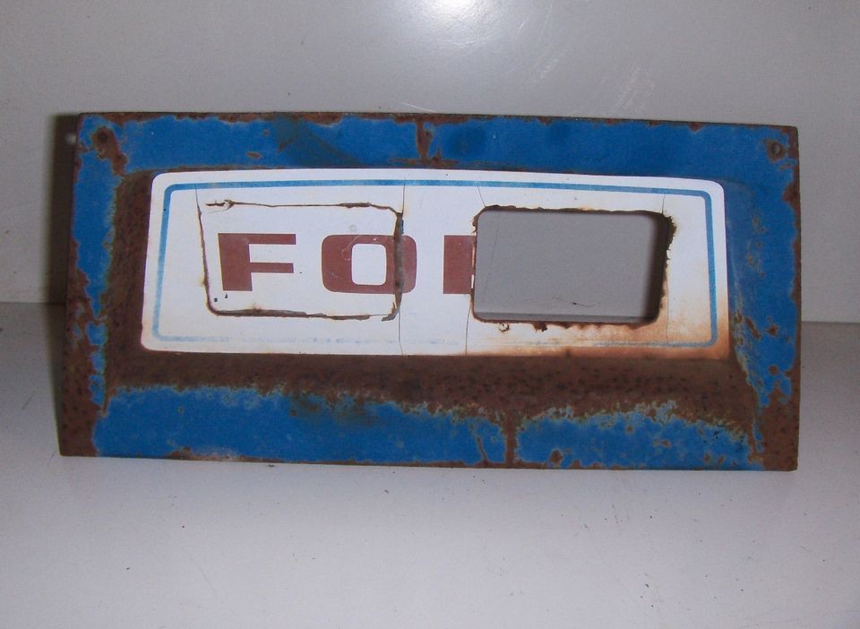 FORD 145 LAWN & GARDEN TRACTOR HEAD LAMP BEZEL