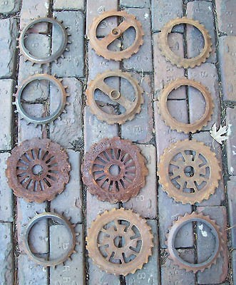 Lot of 12 Antique Iron Seed Corn Planter Plates Primitve Farm Decor 