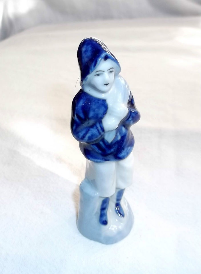 blue boy figurine in Figurines