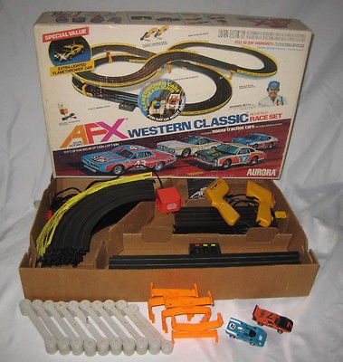 AURORA AFX HO SCALE RACE SET WITH TWO CARS IN ORIGINAL BOX WORKS