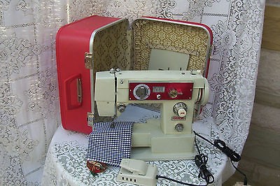 VINTAGE PORTABLE BROTHERS SEWING MACHINE IN RED SUITCASEW/KEY & W 