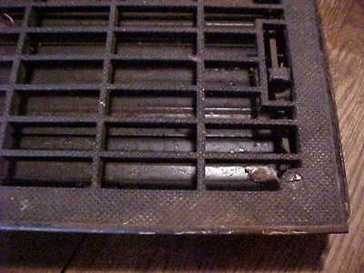 Vintage cast iron heating grate with damper textured design