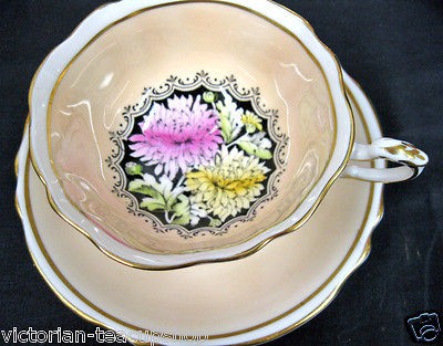 paragon flowered mums tea cup and saucer duo peach center