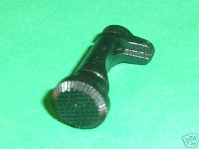 1911 45 AUTO EXTENDED CHECKERED MAG CATCH BLUED STEEL PART# 4542B