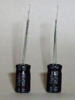 nonpolarized 2x capacitors 47uf quad 405 1 from united kingdom