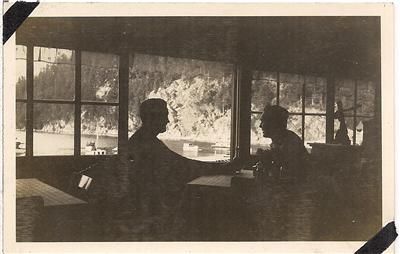   Men Drink Beer Windowside Table Horseshoe Bay Vancouver