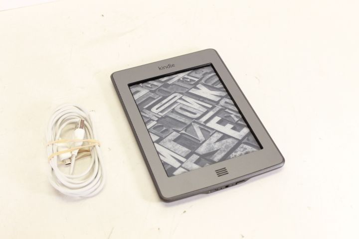 100 % functional  kindle d01200 wifi digital book reader