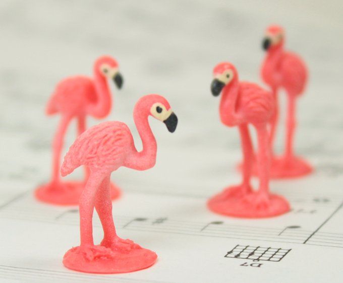 these are cute hand painted soft rubber flamingos that are about 1