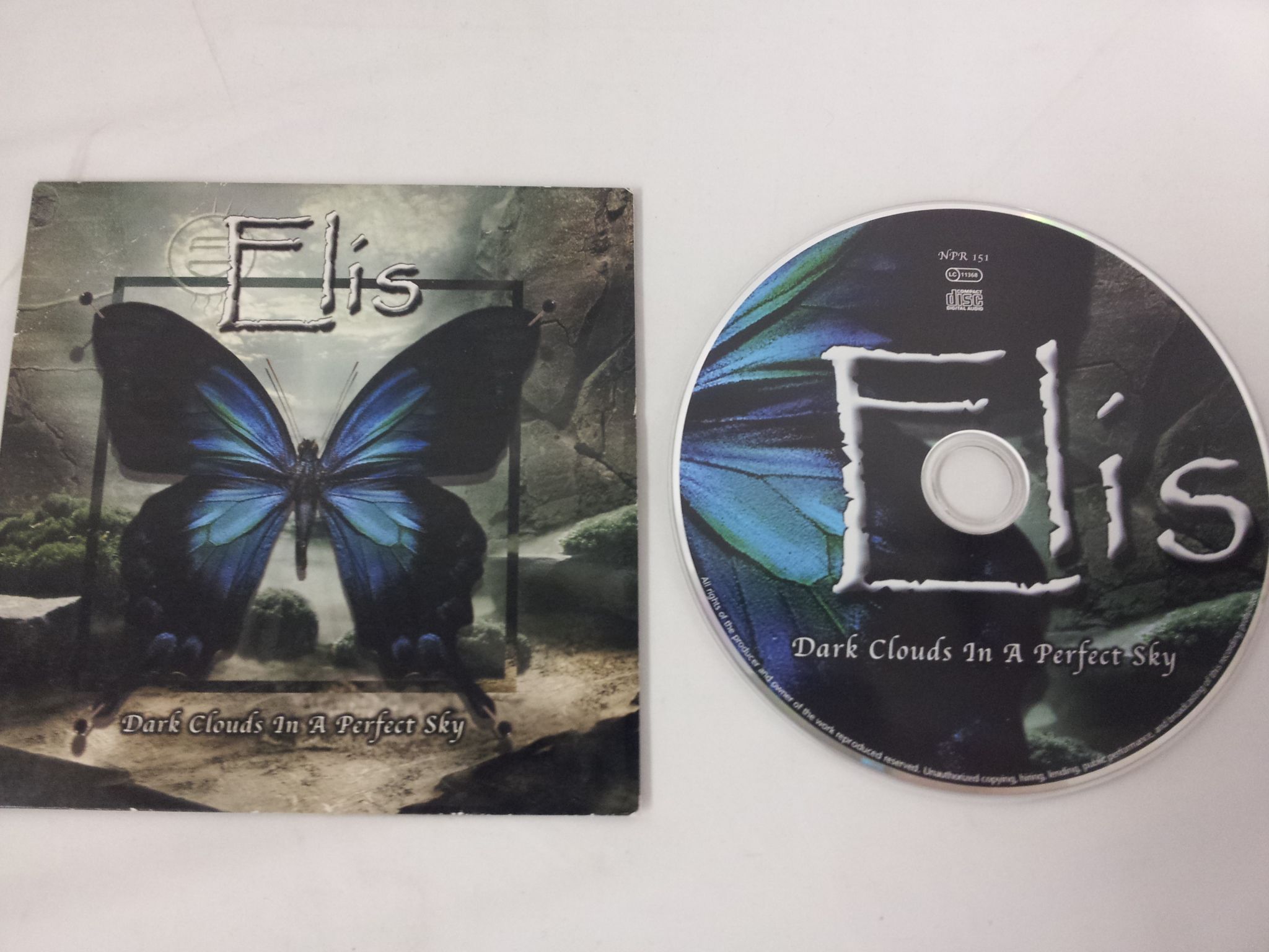 CD PRMO Elis Dark Clouds in a Perfect Sky METAL