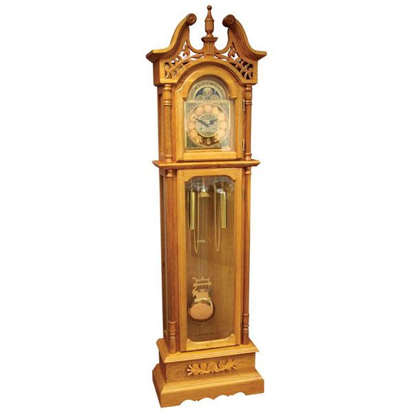 This regal oak grandfather clock has an old world elegance befitting