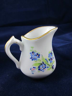 One Limoges France mini pitcher creamer gold trimmed