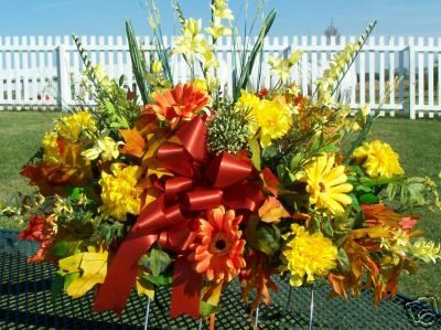 Cemetery Grave Tombstone Saddles Yellows and Orange