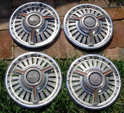 Set of FOUR ** SS    Impala Chevelle Camaro Hubcaps   1965    62 63